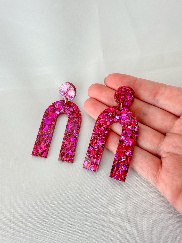 Pink glitter arch dangles